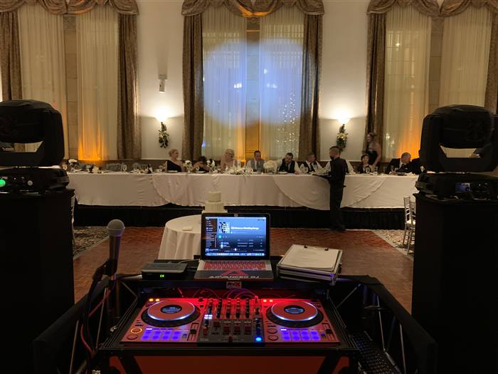 Wedding reception with uplighting and DJ booth