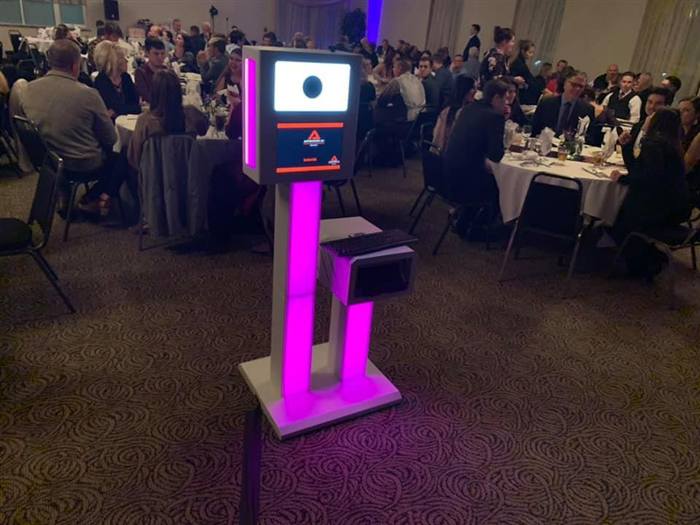 Advanced DJ photo booth kiosk set up at a banquet hall